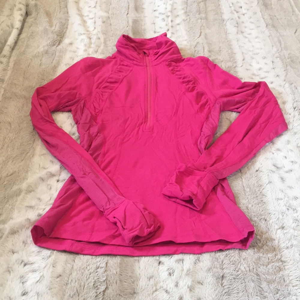 Hot pink Lululemon running top.